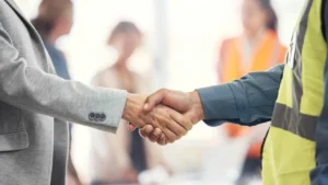 Handshake Between a Facility Manager and Safety Consultant