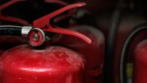 Closeup of red fire extinguishers used for commercial fire safety